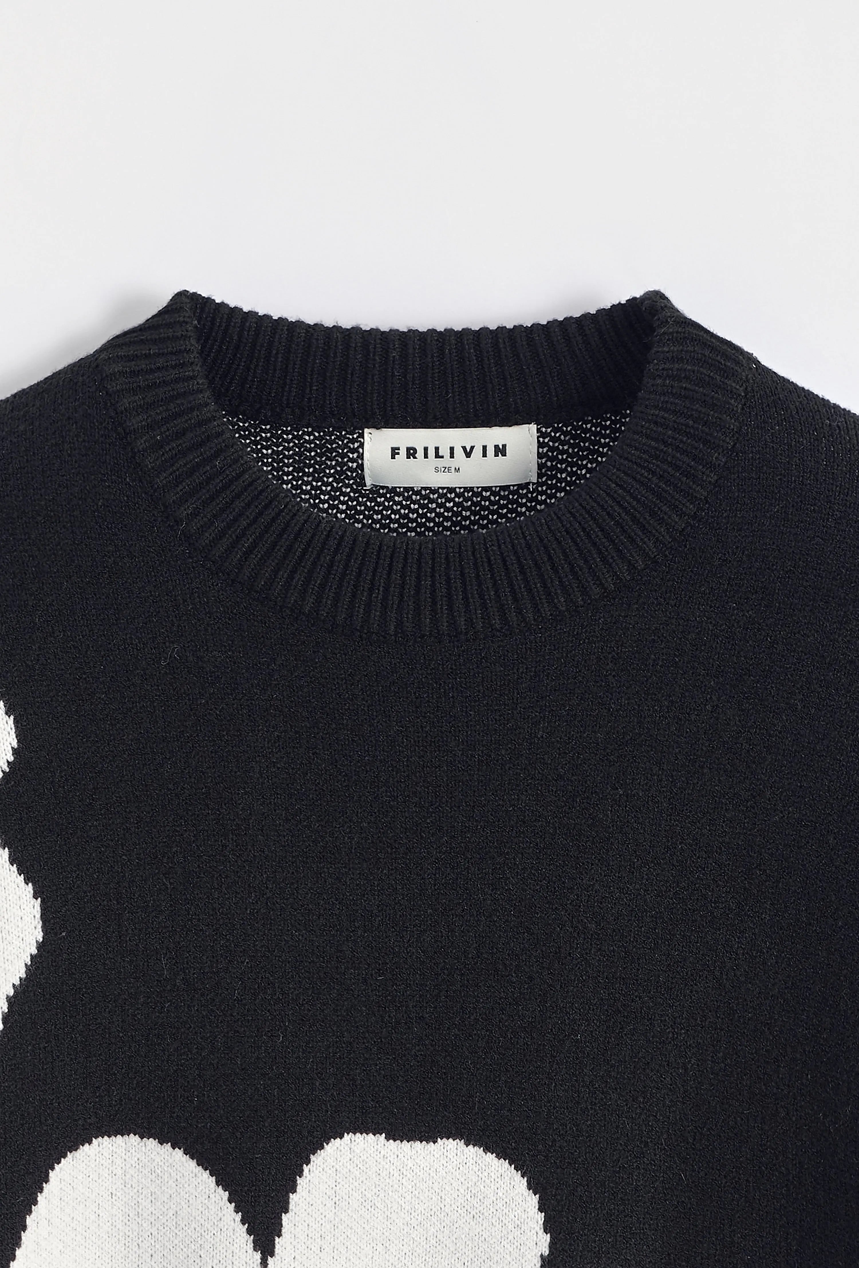 Pull noir homme à grosses fleurs blanches bonhomme