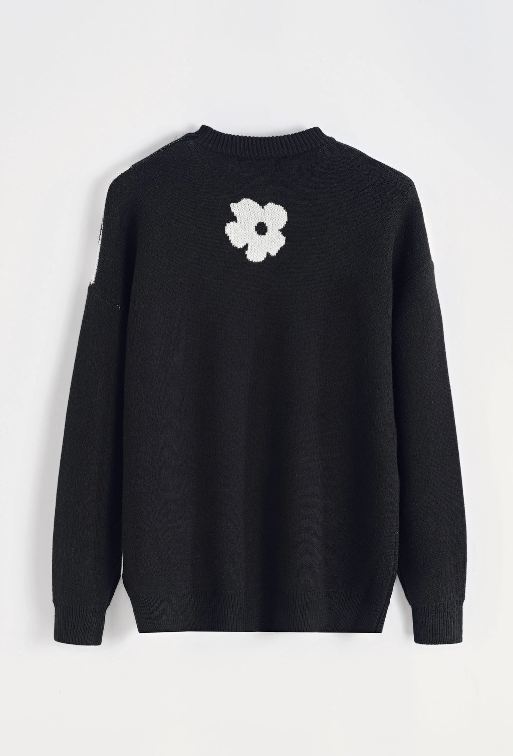 Pull noir homme à grosses fleurs blanches bonhomme