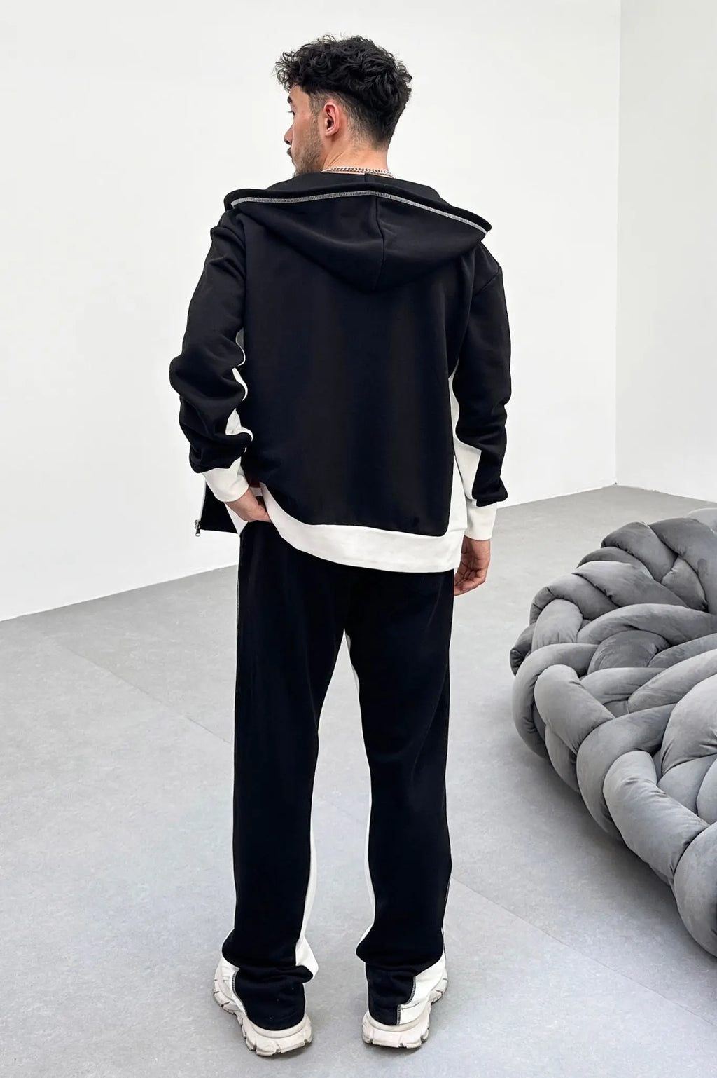 Ensemble jogging bi couleur veste et pantalon jogging coup flare noir blanc bonhomme