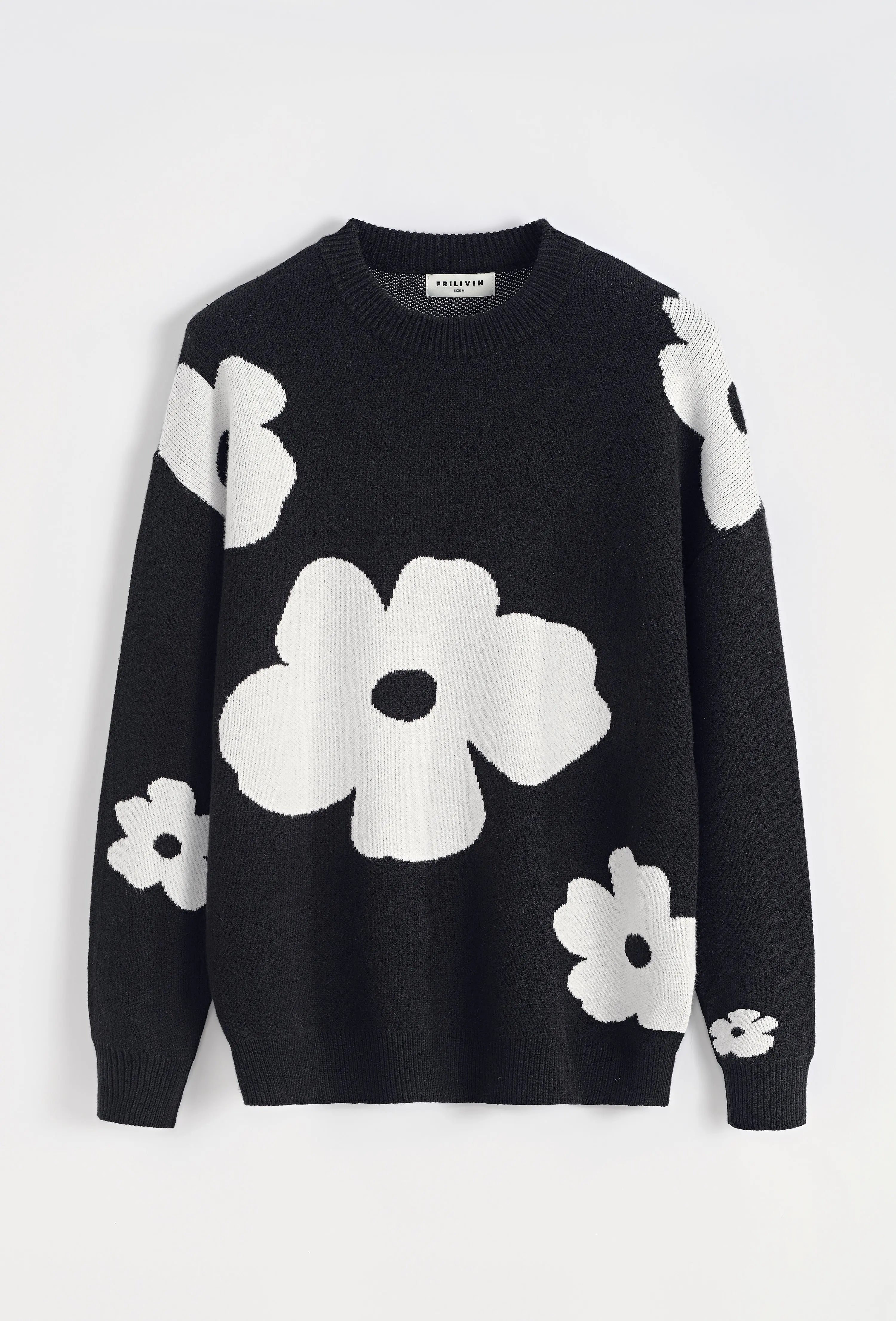 Pull noir homme à grosses fleurs blanches bonhomme
