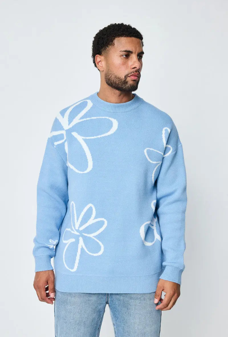 Pull bleu clair homme à motifs fleurs blanches bonhomme