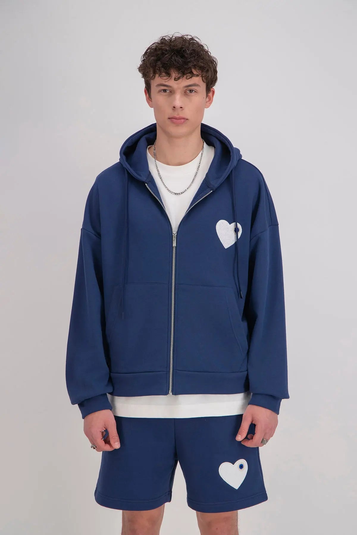 Veste Marine Coeur Blanc avec capuche et fermeture Zip bonhomme