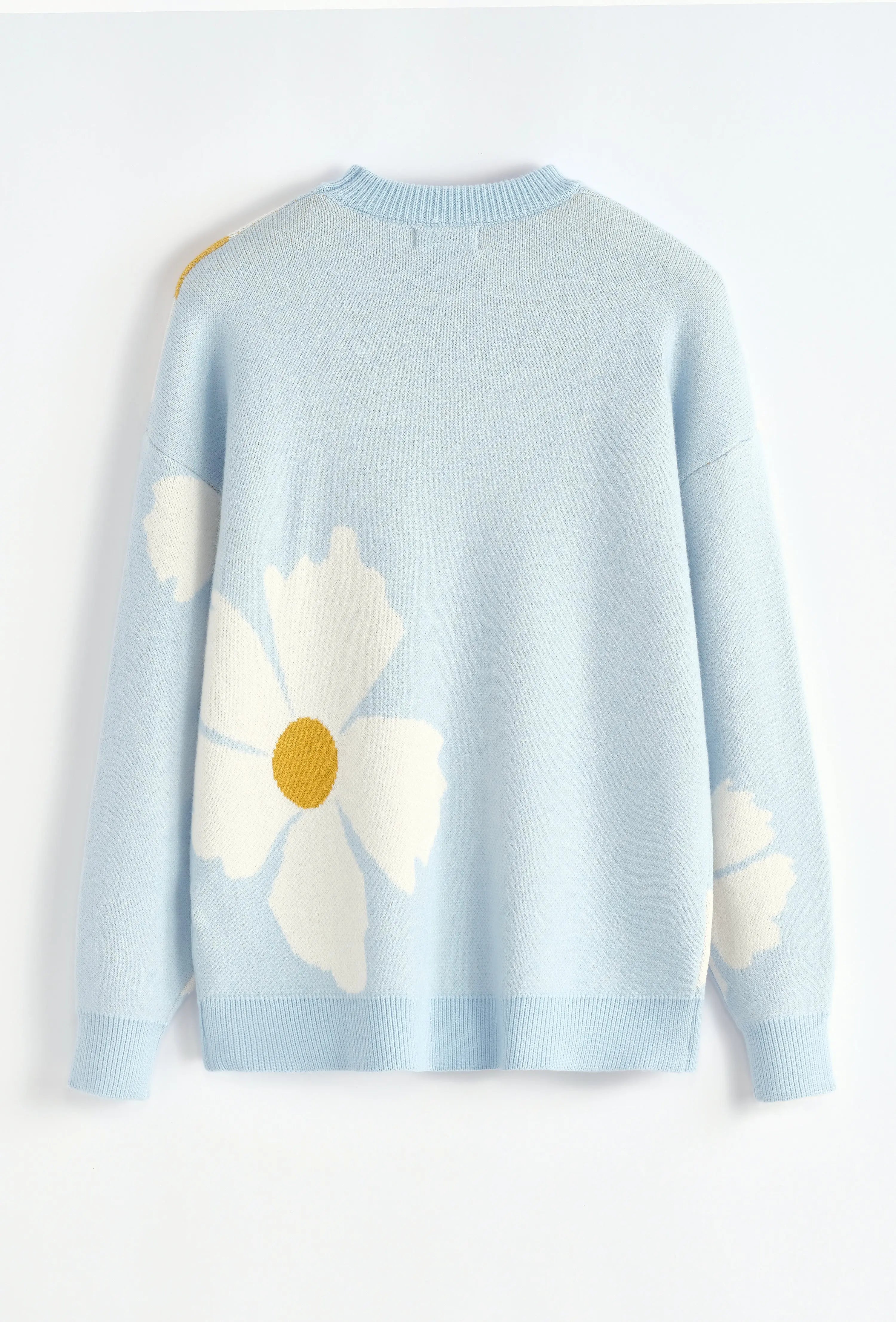 Pull bleu ciel à fleurs blanches bonhomme