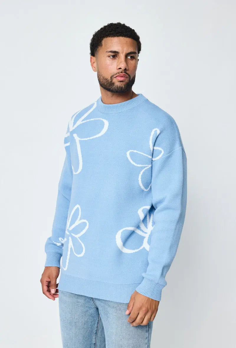 Pull bleu clair homme à motifs fleurs blanches bonhomme