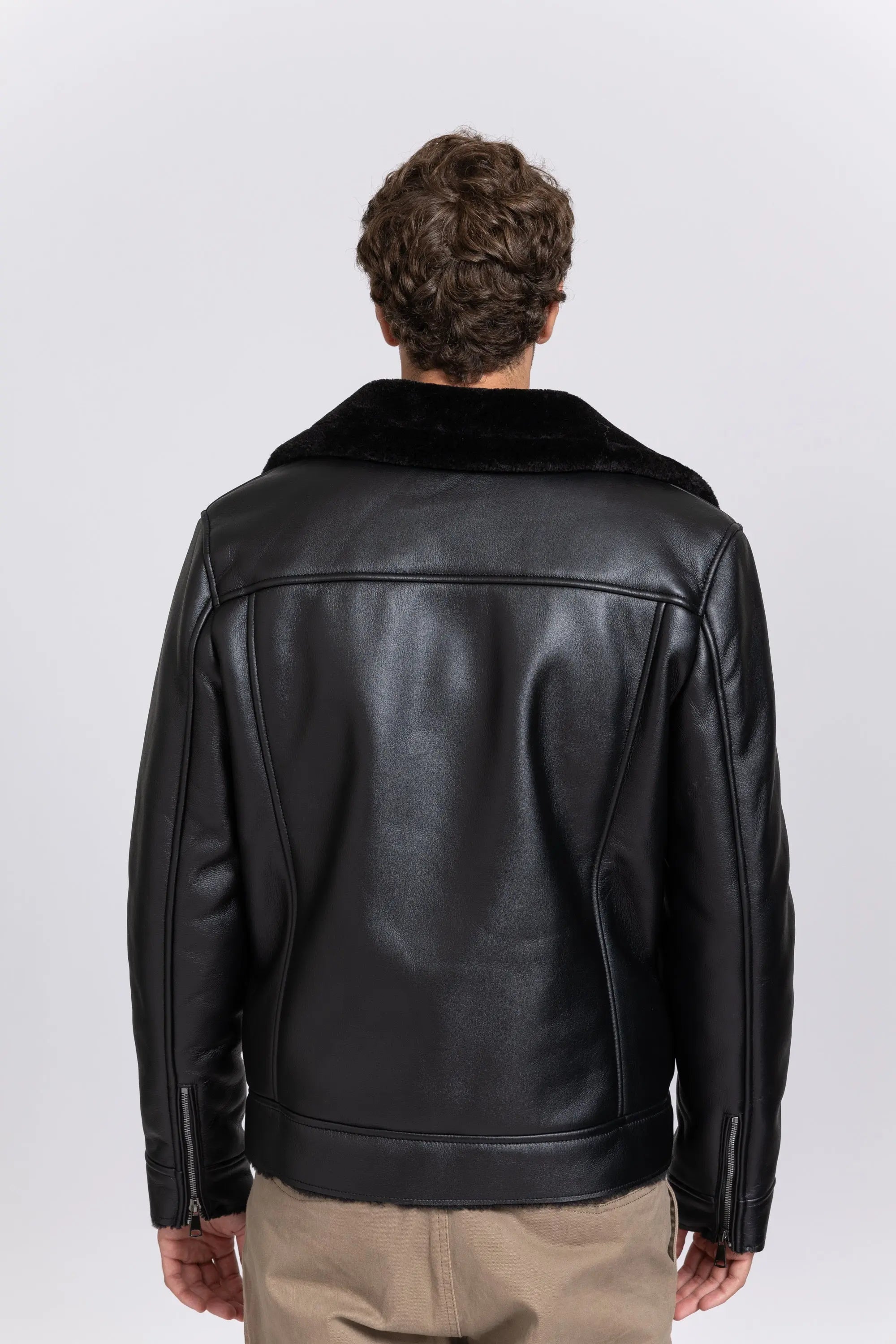 Blouson aviateur homme en simili cuir noir avec col effet mouton bonhomme