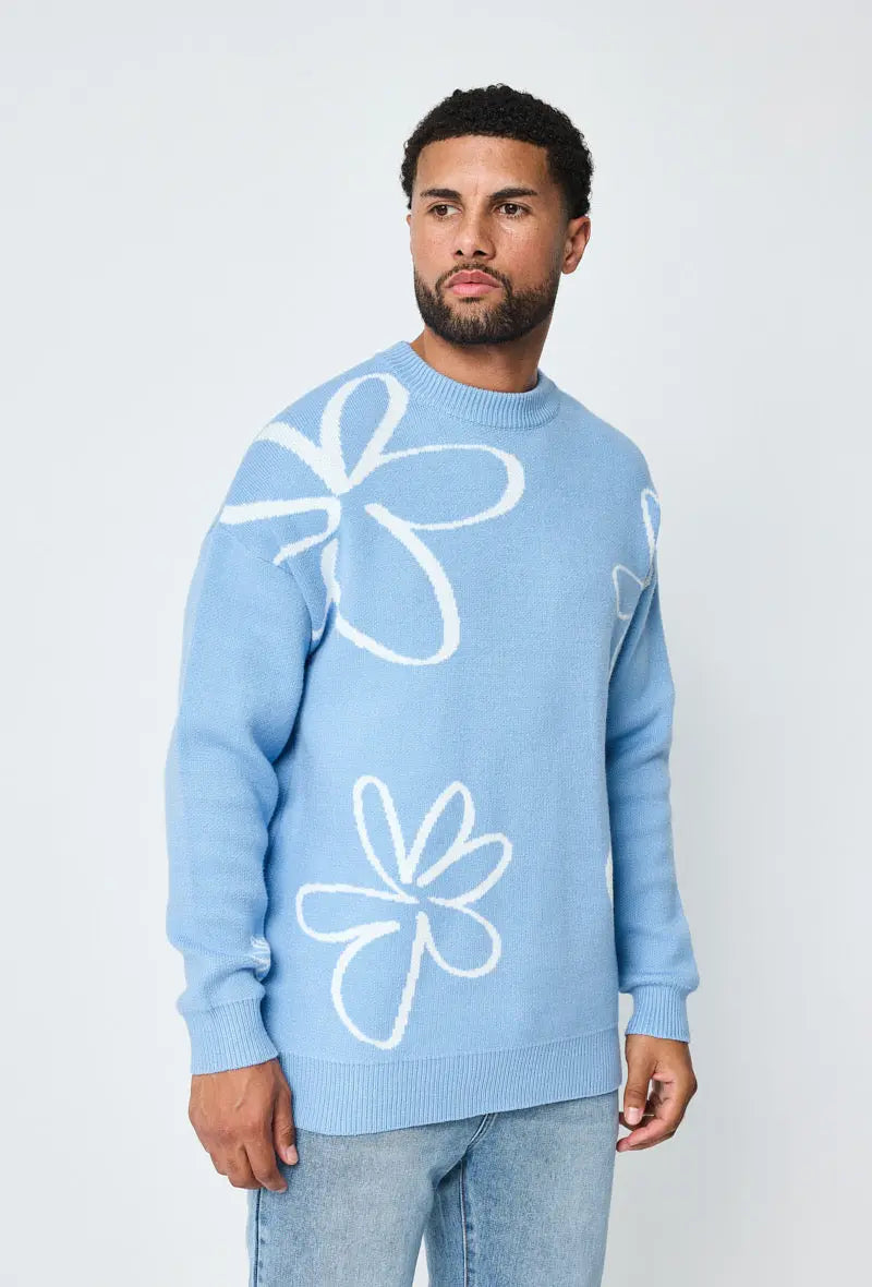 Pull bleu clair homme à motifs fleurs blanches bonhomme