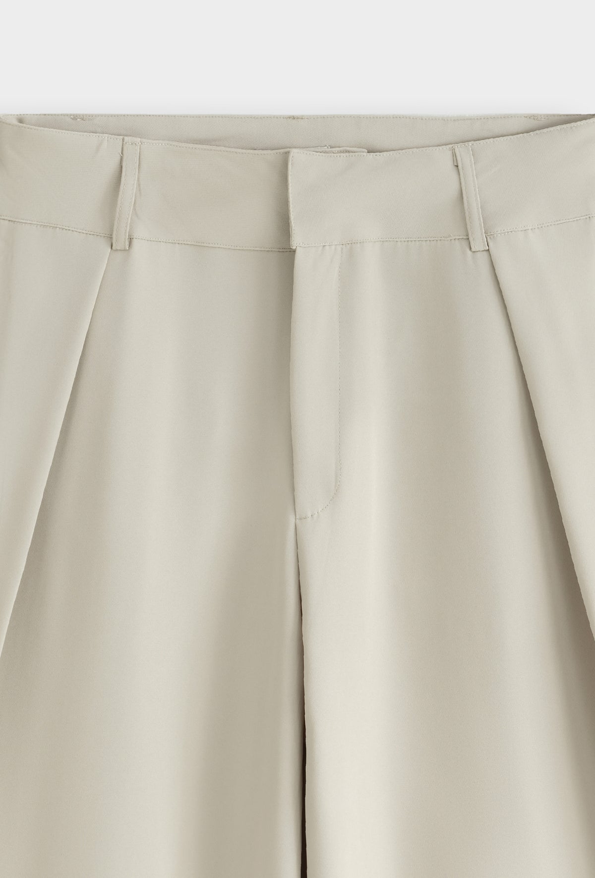 Pantalon large à pinces taille haute coupe fuselée