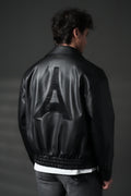 Blouson homme simili cuir noir oversize, Tour Eiffel en strass dans le dos, col chemise à pressions