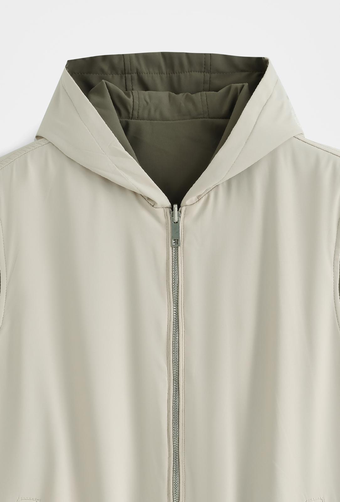 Veste sans manches réversible à capuche