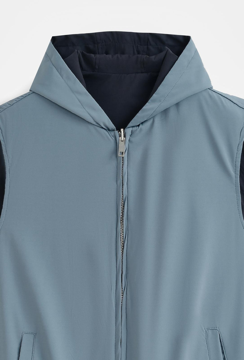 Veste sans manches réversible à capuche