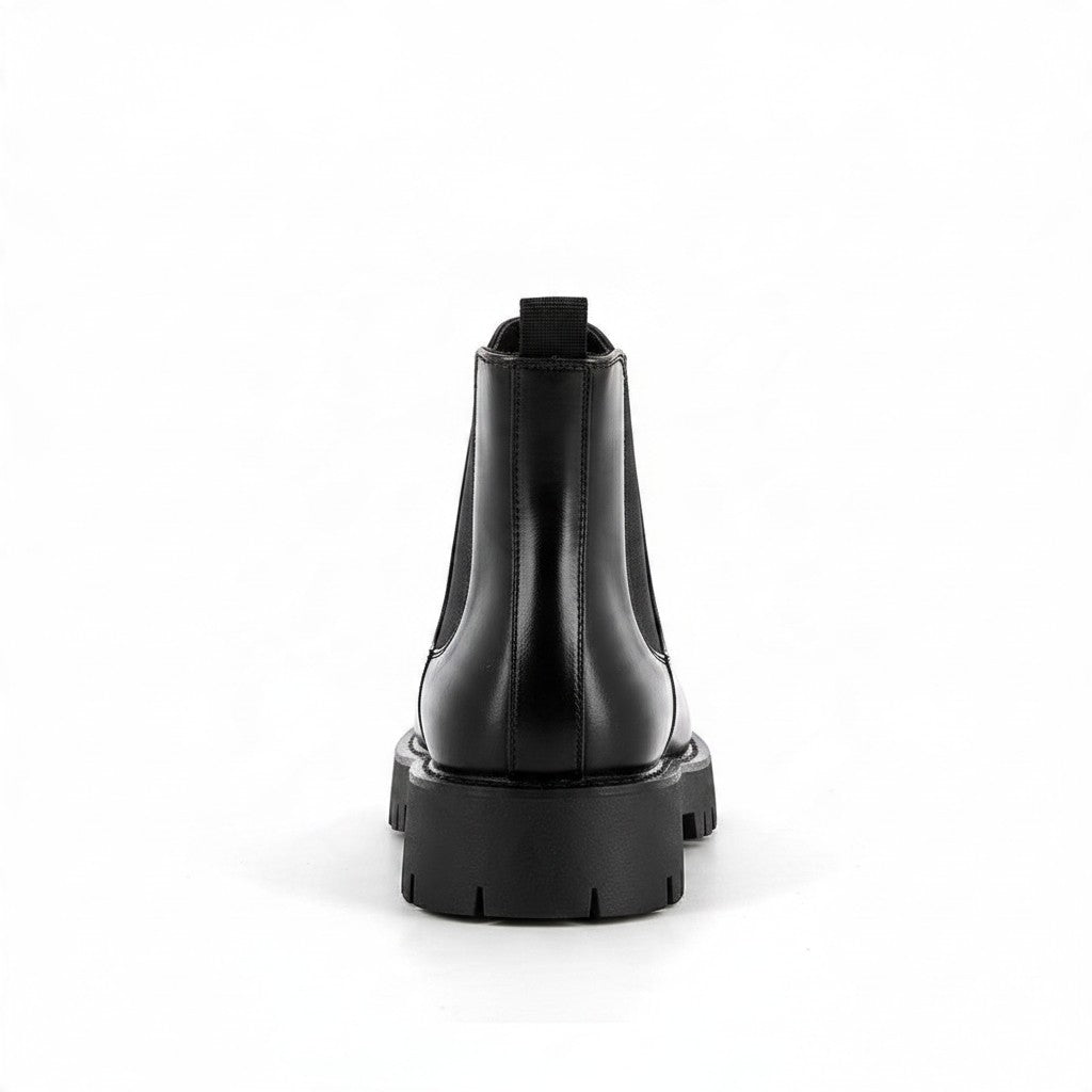Bottines Chelsea homme Bonhomme noires en polyuréthane avec semelle épaisse crantée et tirette arrière, vue arrière.