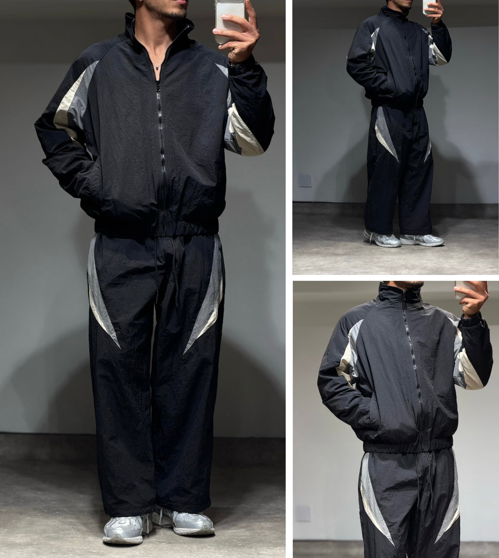 Ensemble survêtement rétro bonhomme en nylon noir avec empiècements gris et écru et doublure polaire chaude