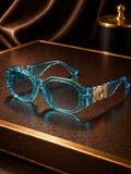 Lunettes de soleil géométriques monture noire ornement doré bonhommeboutique